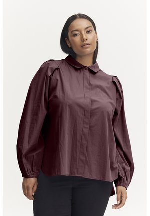 Burgundy button-up shirt with a collar, puffed long sleeves, and elastic cuffs. Made from smooth, lightweight fabric with a structured fit.