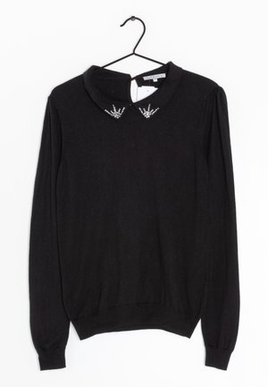 Stickad tröja - black