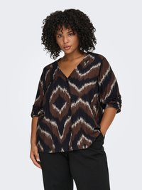 Brown and black patterned blouse with a V-neck, featuring wave-like designs and three-quarter sleeves, made from lightweight fabric.