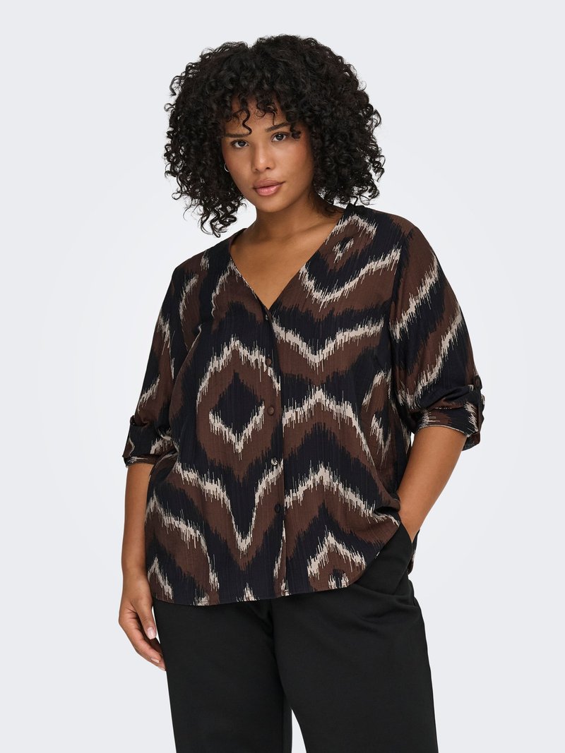 Brown and black patterned blouse with a V-neck, featuring wave-like designs and three-quarter sleeves, made from lightweight fabric.