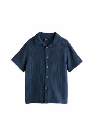 Tumesinine lühikeste varrukatega nööpidega särk, millel on tekstureeritud kangas ja krae, esitatud tasapinnaliselt valgel taustal.