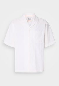 Short-sleeve, white shirt made of lightweight fabric. Features a subtle pattern, button-down front, and a single chest pocket.