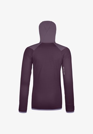 Hooded long-sleeve top in dark purple with textured paneling and reflective logo on the sleeve. Features a fitted design and flat seams.
