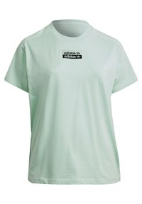 Světle mátově zelené bavlněné tričko s kulatým výstřihem. Má černou obdélníkovou nášivku s bílým textem na hrudi. Uvolněný střih.