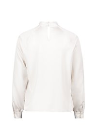 Blusa a manica lunga in bianco puro, realizzata in morbido tessuto satinato. Presenta un colletto alto, chiusura con bottoni sul retro e polsini aderenti.