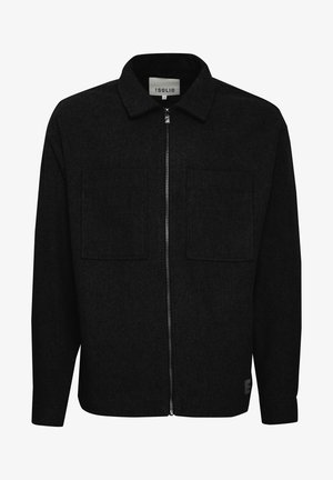 Veste zippée noire en matériau en feutre. Elle présente un col, deux poches frontales et un label de logo en bas à droite.