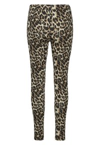 Leopardmönstrade leggings med en mjuk textur, i en färgskala av svart och beige. Designen har sömlösa sömmar och en åtsittande passform.