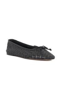 Black woven leather ballet flat with a rounded toe, decorative bow, and a flexible sole. Textured surface adds visual interest.