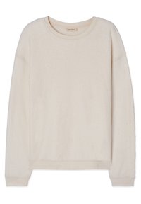 Ljusbeige sweatshirt gjord av texturerad tyg. Har en rund halsringning, sänkt axelled och ribbade muddar och fåll. Enkelt design.