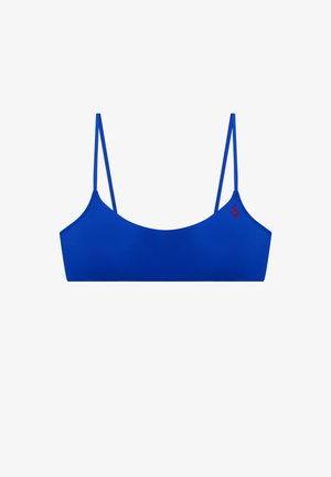 Bralette bleu avec fines bretelles réglables et petit logo rouge brodé sur le côté gauche, présenté sur un fond blanc uni.