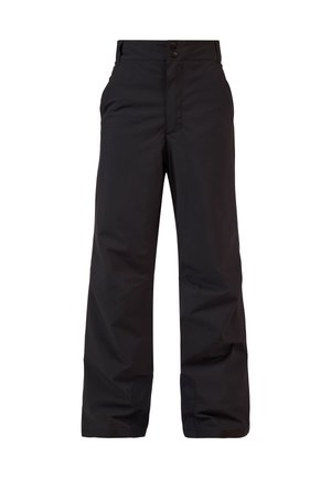 Giubbotto imbottito arancione e nero, strato interno in pile, pantaloni neri, indossa un berretto a righe con pompon, tiene dei guanti neri.