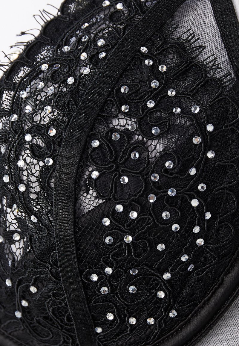 Schwarzer Spitzen-BH mit komplizierter floralem Stickerei, verziert mit klaren Rhinestones. Glattes Material und verstellbare Träger.