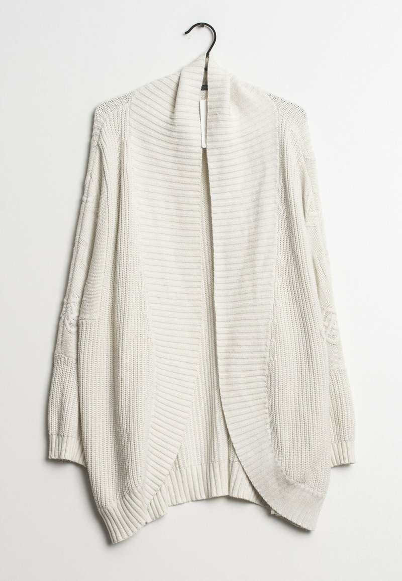 Åben-front cardigan i lys creme, med ribbet tekstur, bred sjalkrave og strikkede ærmer med mønstre. Blødt stof.