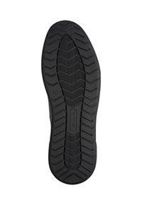 Suola di scarpa in gomma nera con un motivo di presa testurizzato, caratterizzata da scanalature a zigzag e un design della punta arrotondata. Taglia contrassegnata come 42.