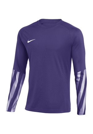 Fialové sportovní tričko s dlouhým rukávem s bílým logem Nike na hrudi a světle fialovými geometrickými vzory na spodní části rukávů, jednobarevné pozadí.