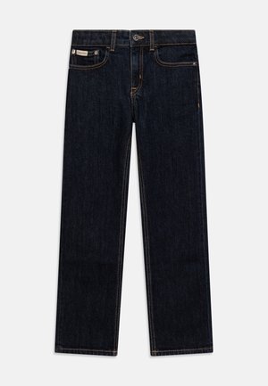 Jeans de denim oscuro con un diseño de pierna recta, que incluyen costuras en contraste, cinco bolsillos y un parche con el logo de Calvin Klein en la cinturilla.