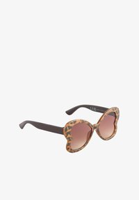 Selezionato, tortoiseshell brown