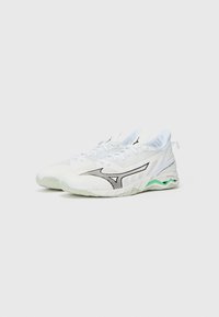 White athletic shoes with mesh fabric, black accents, and a green outsole. Features a sleek design and textured surface for improved grip.
