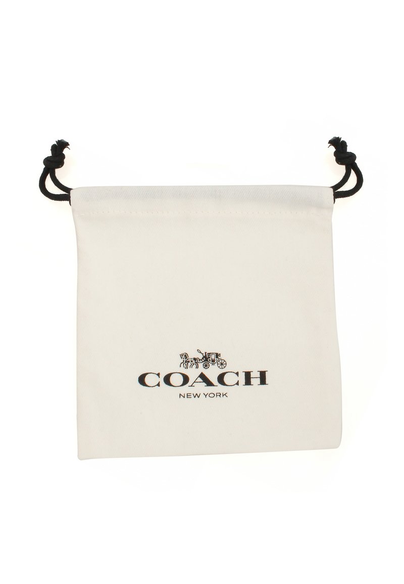 Wit stoffen trekzak met een zwart "COACH NEW YORK" logo en een decoratief ontwerp van een paard en wagen.