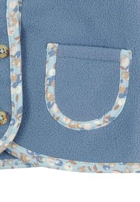 Blue fleece garment featuring floral patterned trim, button closure, and small pocket with rounded edges. Soft texture and casual design.