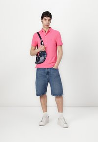 Tommy Hilfiger SLIM - Polo shirt - pink alert