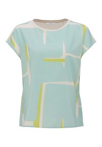 Haut à manches courtes en tissu bleu clair avec des motifs géométriques abstraits blancs et vert lime. Encolure ronde et coupe décontractée.