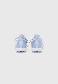 Purple athletic shoes with ribbed texture, white accents, and round logo on heel. Features tied laces and a cushioned ankle collar.