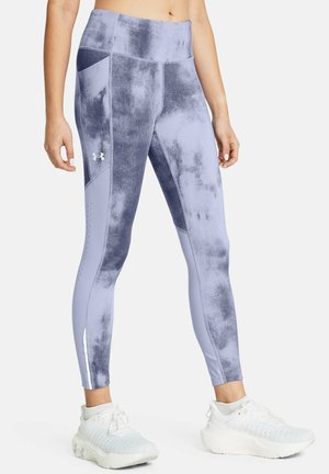 Hoge taille legging in lichtpaars met een gestructureerd ontwerp, zijzakken en geperforeerde accenten bij de kuiten voor ademend vermogen en stijl.