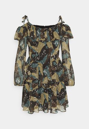 Off-shoulder long-sleeve camouflage dress with ruffled neckline, tiered skirt, and adjustable tie straps in green, brown, black, and white colors.