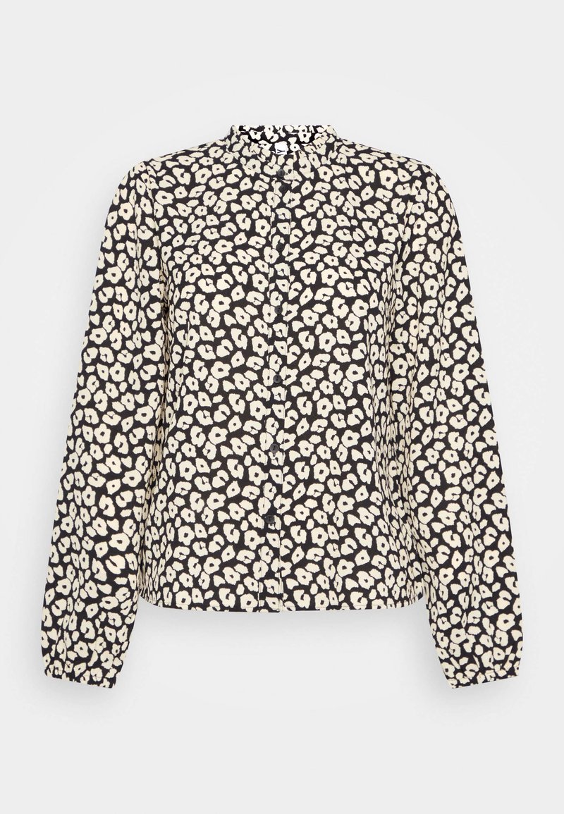 Svart blus med långa ärmar och vitt blommönster, med hög halsringning och knäppning fram.