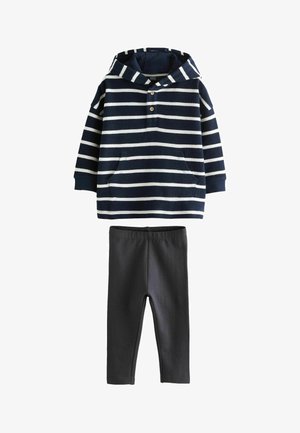 Navy and white striped hoodie with a kangaroo pocket and button placket, paired with black leggings made of soft, stretchy fabric.