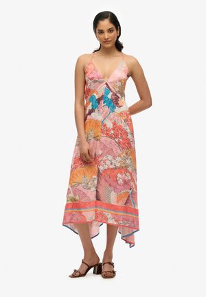 Abito senza maniche a fiori con scollatura a V profonda, realizzato in tessuto leggero nelle tonalità di rosa, arancione e blu, con un orlo a fazzoletto.