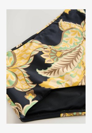 Badebekleidungsstoff mit einem auffälligen Blumenmuster in Gelb und Grün auf schwarzem Hintergrund, mit glatter Textur und kontrastierenden Nähten.