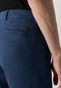 BOSS SLIM - Chino hlače - open blue