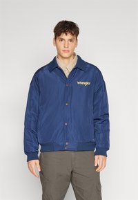 Wrangler - TRANSITIONAL JACKET - Bomber tipa jaka - black iris Miniatūras attēls 1