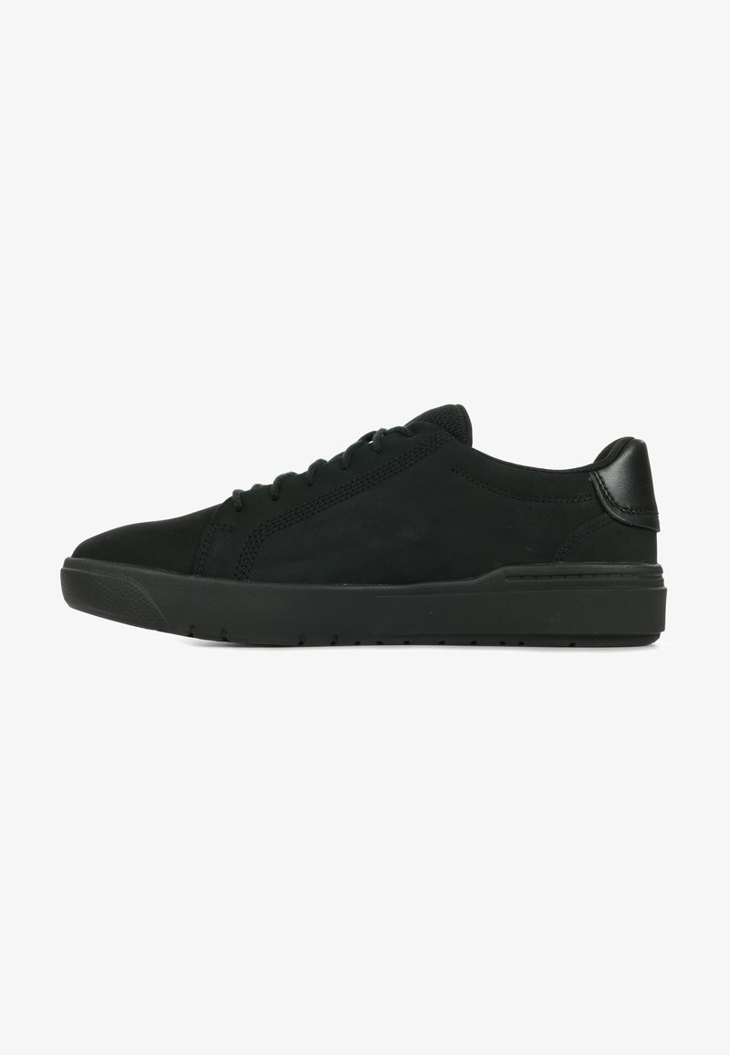 Black sneakers made of suede with a smooth leather accent at the heel. Features round toe, lace-up design, and a textured rubber sole.