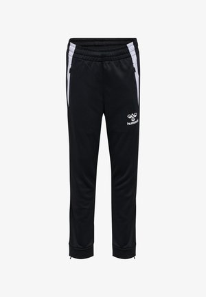 Zwarte sportbroek met witte zijstrepen, ritszakken, elastische tailleband en wit Hummel-logo op het bovenste gedeelte van het linkerbeen.