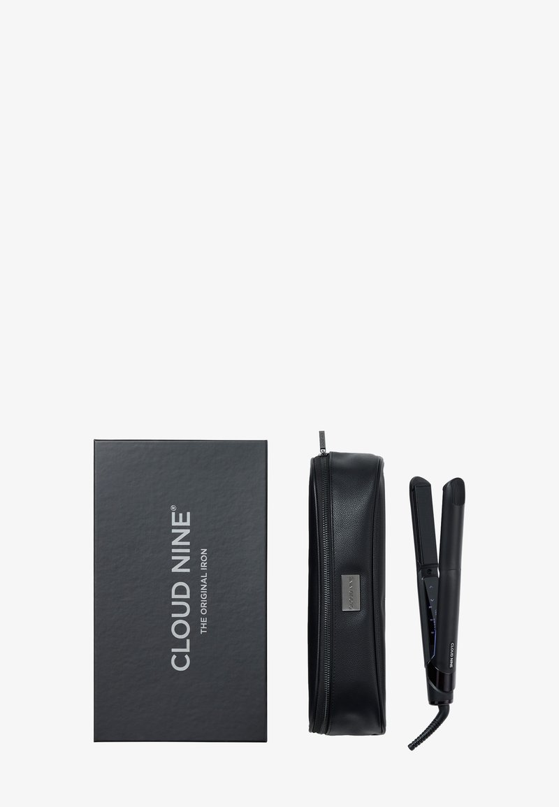 Cloud Nine Original-Eisen mit einem eleganten schwarzen Design, begleitet von einem passenden Reißverschlussetui und einer Verpackung mit silberner Beschriftung.