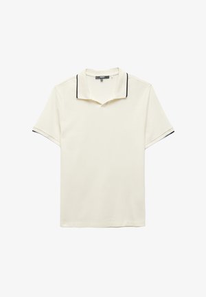 Cremfarbener Poloshirt mit kurzen Ärmeln und schwarzem Saum am Kragen und den Ärmelsäumen, flach auf einem weißen Hintergrund ausgebreitet.