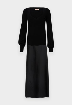 Mustmustähe, millel on sobiv kudumipealne osa ja voolav satiinseelik. Omab pikki, puhv-sleeve ja ruudukujulist kaelust. Ühtlane tekstuur kogu ulatuses.