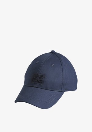 Navy blue baseball cap with curved brim and black patch reading "COOL KIDS CLUB" on front panel.