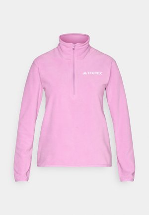 Fleecepullover i ljusrosa med halvlång dragkedja vid kragen. Har långa ärmar och en vit TERREX-logga på bröstet. Mjuk textur.