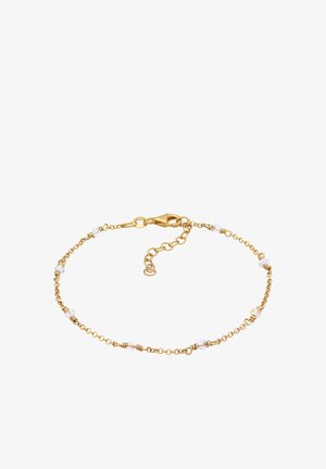 Goldene Armbandkette mit klaren, facettierten Perlen und dekorativem Zubehör; verfügt über einen verstellbaren Verschluss und eine Kettenverlängerung für flexible Größenanpassung.