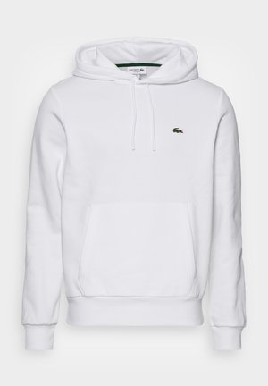 White hoodie with a front pocket, drawstrings, ribbed cuffs, and hem. Features a small green Lacoste logo on the chest.