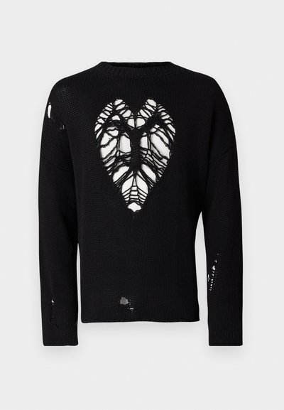 Black knitted sweater featuring a heart-shaped cutout in the center and distressed detailing on sleeves and hem. Textured fabric.