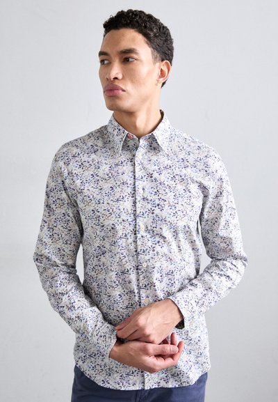 Long-sleeve button-up shirt featuring a floral pattern in shades of purple and blue on a light background, made of woven cotton fabric.