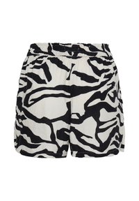 Shorts à taille élastique rayés zèbre noirs et blancs, coupe ample et tissu léger.