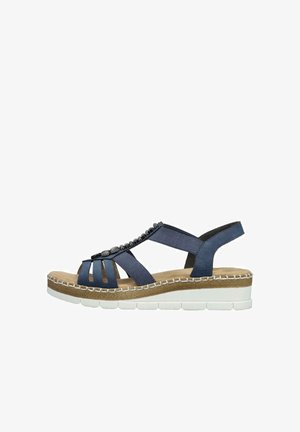 Blue leather sandal with multiple front straps, decorative beads, and a textured sole. Features a low wedge heel and open design.