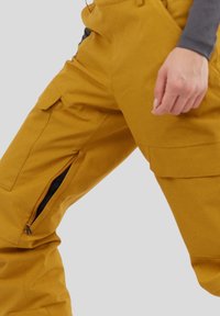 Fundango SAKURA  - Latzhose - senf