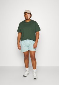 Ellesse TEYNOR - Plavecké šortky - aqua